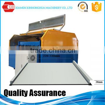 Portable standing seam roof panel machine for straight and tapered