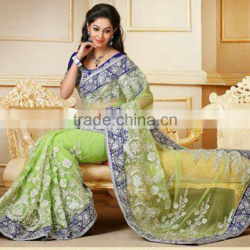 Entracing Green Color Netted Saree With Blue Bordered Blooming Bliss Designer Sarees Collections