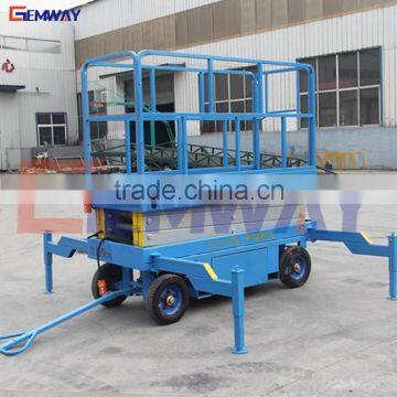 Mobile single person mini scissor lift for cleaning