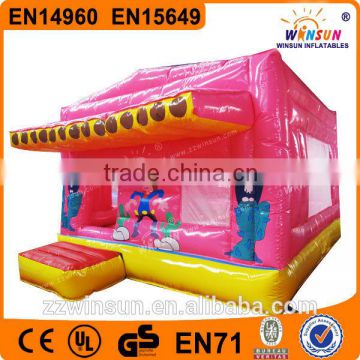 home yard kids playing jumping inflatable castle