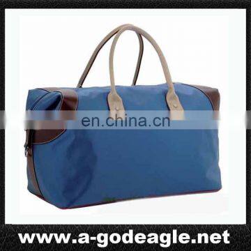 luggage bag with leather piping handle