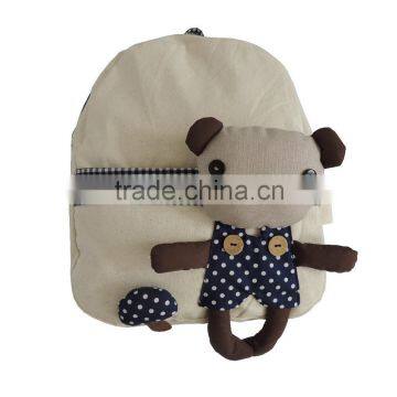 Cute cream-colored canvas school backpack bag with fabric bear