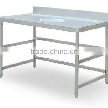 Commercial stainless steel work table with waste collection