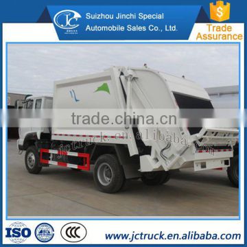 Affordable 4000kg HOWO barrels of compressed garbage truck of Preferential price