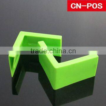 plastic displaying casters for cardboard shelf