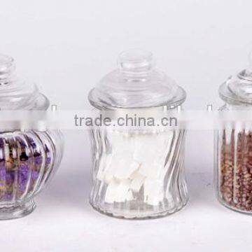 transparent glass candy jar with glass cover