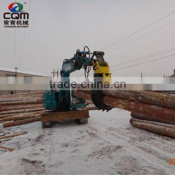 Hydraulic rotating log grapple