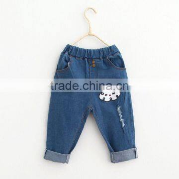 Do the old hole cartoon cow embroidery denim trousers