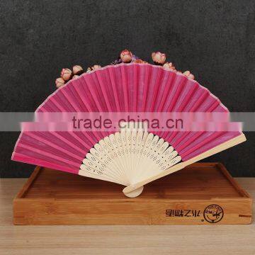 Factory Direct Bamboo Hand Fan Wedding Gift Cloth Folding Hand Fan in Plain Color photo-2