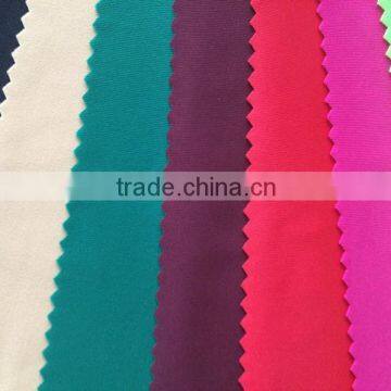 Knitting polyester spandex four way stretch swimwear fabric semi-dull spandex jersey fabric polyester elastic stretch fabric