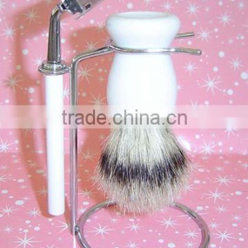 white shaving brush with a stand