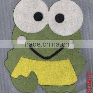 Laser-cut fabric applique patterns frog patch