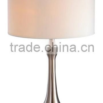 Contracted decorative arced metal pedestal with switch table lamp