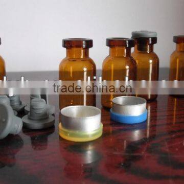 Amber glass vial with flip off caps