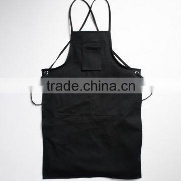 Black canvas work apron with crossback straps