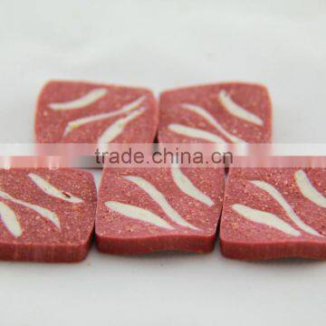 pig food (shaped squared beef pieces)