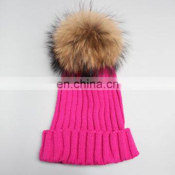 Rose color top grade winter acrylic beanies with large natural fur ball