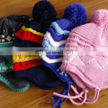 Knitted acrylic beanie hat with a ball on top four colors fashion for kids