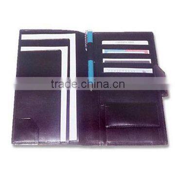 Promotional travel wallet with snap closure