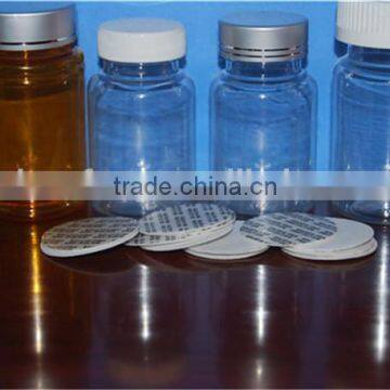 plastic bottle and golden caps