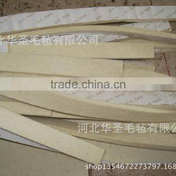 Customized needle punched adhesive felt strip