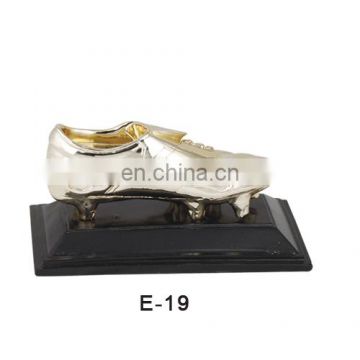 china manufacturer silver resin sports soccer shoes resin trophies