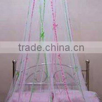Romantic mosquito net with colorful ribands