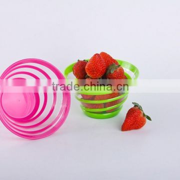 PLASTIC SPIRAL FRUIT SALAD BOWL