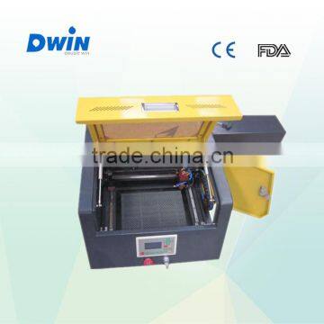 Jinan factory small working area co2 mini laser engraver / engraving machine