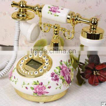 Corded wall mounted analog rotary telephone