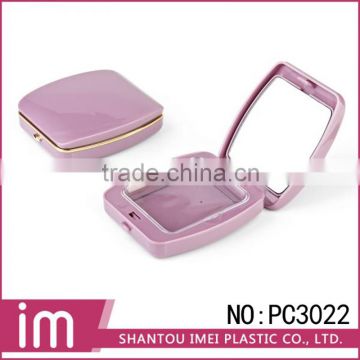 Cosmetic rectangular purple pressed powder case with mirror