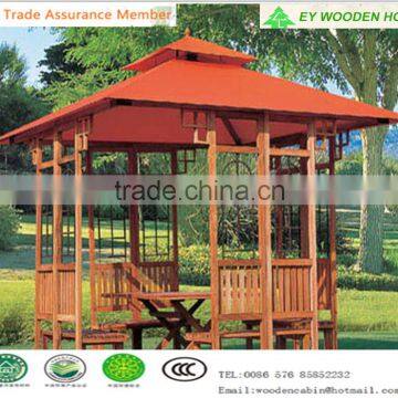 Outside wooden garden pavillion with cover fabric