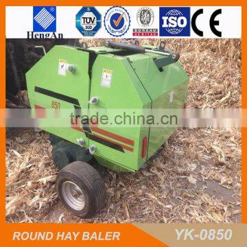 mini round baler to a walk-behind tractor