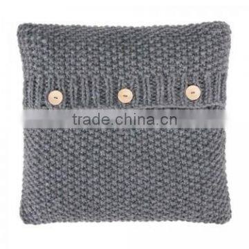 Button knitted cushion