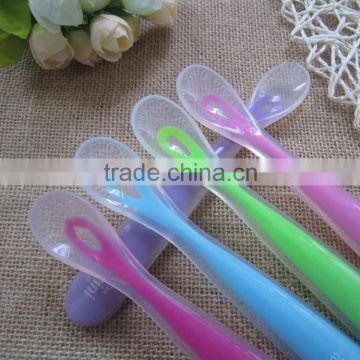 hot sales food grade silicone baby spoon with inserted nylon stick