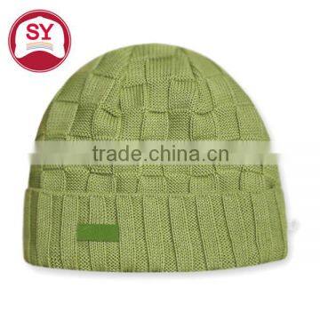 Different kinds of green knit beanie hats