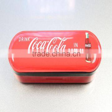 Red rectangular tin box with a birthday party