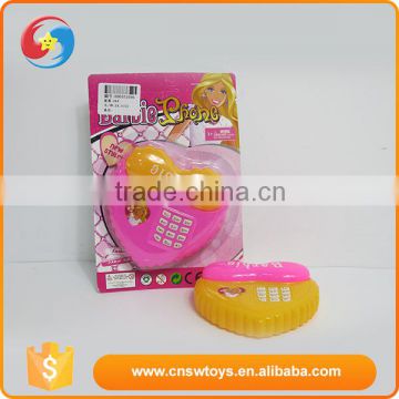 Battery operated heart-shaped plastic telephone toy with light &music