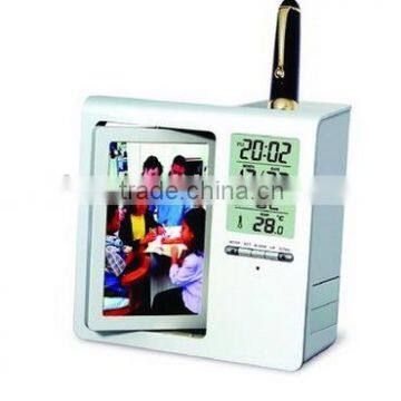 LCD clock with pen holder