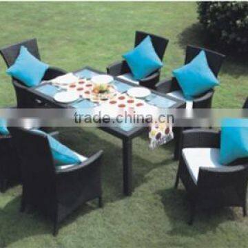 Black wicker six outdoor dining table