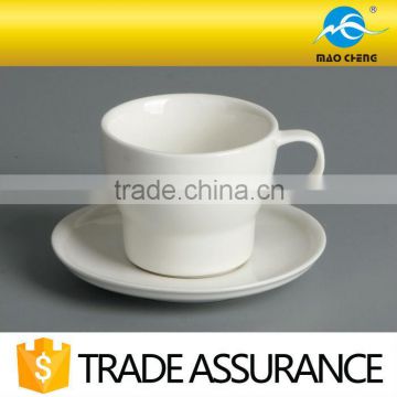 white porcelain coffee cup & saucer