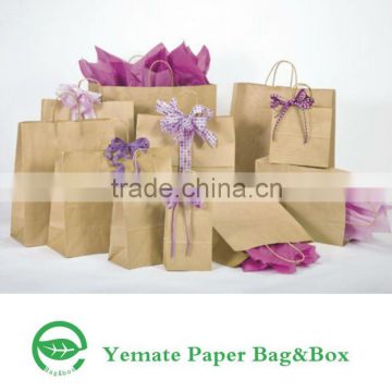 Machine made 100g brown kraft paper bags wholesale with handles for shopping in supermarket