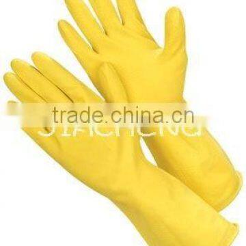 yellow household rubber glove