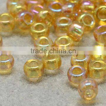 11/0 Glass Seed Beads, Transparent Rainbow, Goldenrod Micro Beads(SEED-Q010-F531)