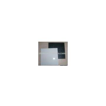 white crystal stone and black porcelain tile