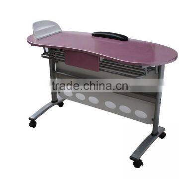 Pink nail salon manicure table