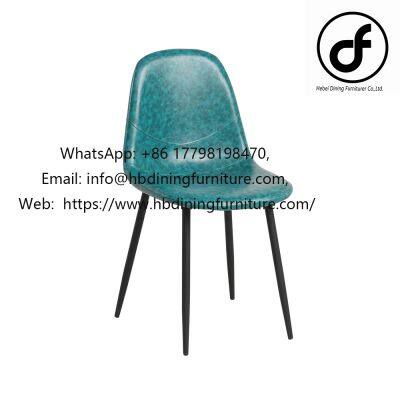 Green leather chair with black metal legs