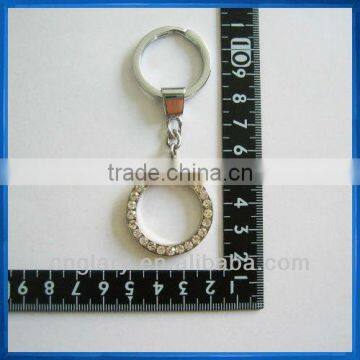 Round metal keychain with rehinstone