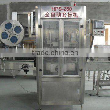 Automatic sleeve labeling machine