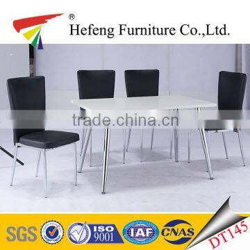 simple structure wood mdf top chrome legs dining table with black chairs 1+4